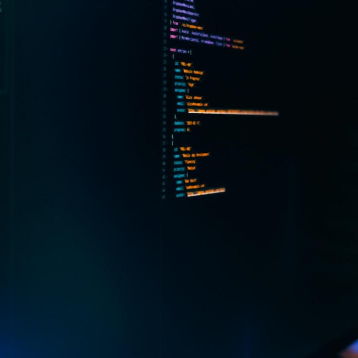 Mobile app project planning workspace with devices and development tools